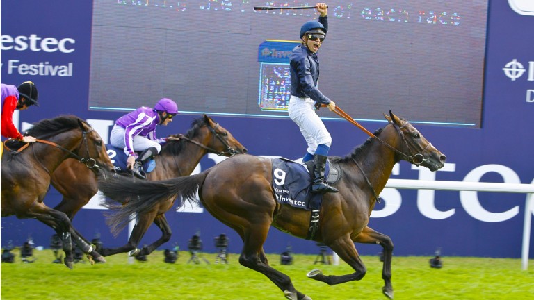 Mickael Barzalona celebrates his head success on Pour Moi in the Derby before the line is crossed