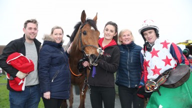 Denise Foster (second right) and Mark Enright celebrate with the team following victory by Miles To Memphis