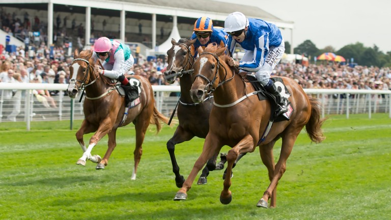 Queen Kindly (right) wins the Lowther with Fair Eva (left), another Frankel filly, in third