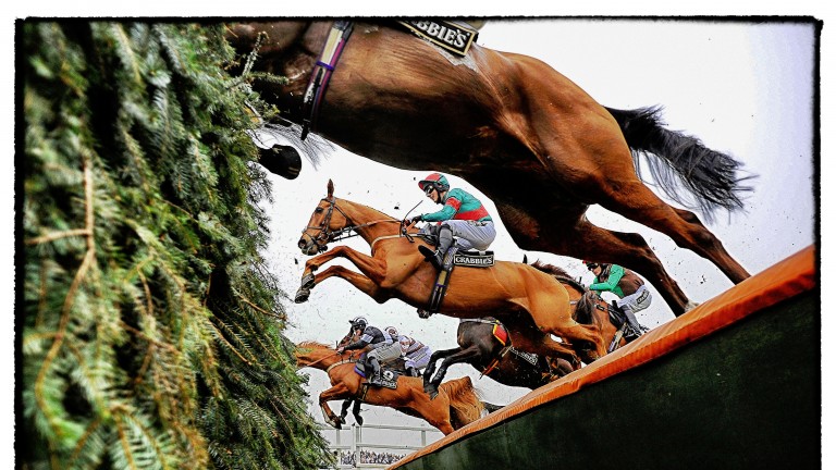 LIVERPOOL, ENGLAND - APRIL 03: (EDITORS NOTE: This image was processed using digital filters) A general view as runners clear the 'Chair' at Aintree racecourse on April 03, 2014 in Liverpool, England. (Photo by Alan Crowhurst/Getty Images)