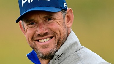 TROON, SCOTLAND - JULY 12: Lee Westwood of England poses with son Sam during previews ahead of the 145th Open Championship at Royal Troon on July 12, 2016 in Troon, Scotland. (Photo by Stuart Franklin/Getty Images)