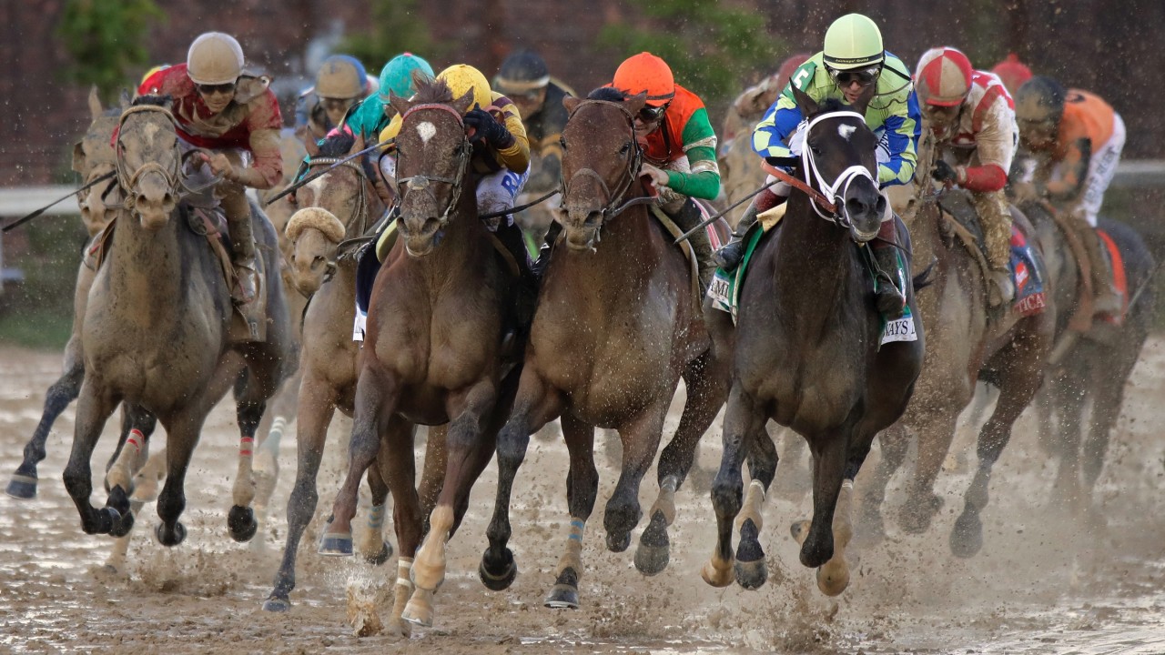 Always Dreaming leads the field into the stretch during the Kentucky Derby