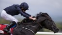 Push the button: Ryan Moore shakes the reins and Caravaggio shows a sparkling turn of foot