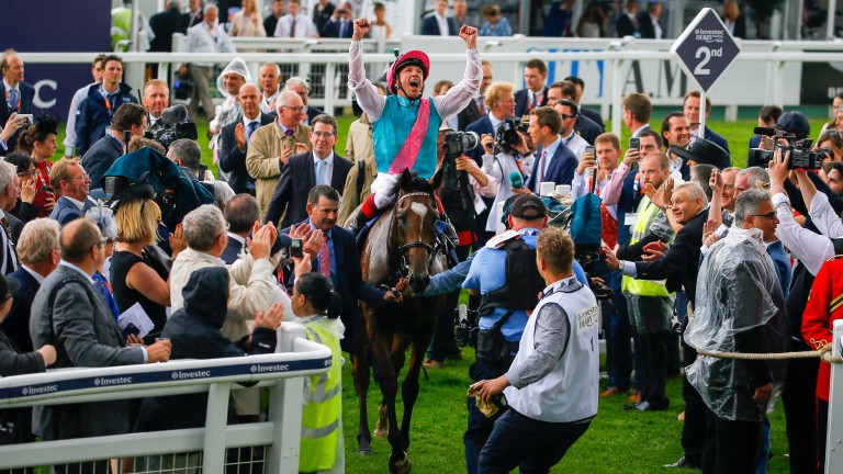Frankie Dettori is euphoric entering Epsom's winner's circle