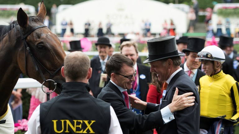 Gracious in defeat: Aidan O'Brien congratulates winning trainer Michael Bell after the brilliant Big Orange triumphs in the Gold Cup