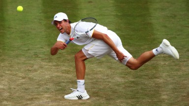 Dominic Thiem in action against Gilles Simon