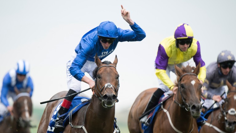 Adam Kirby celebrates his July Cup victory on Harry Angel