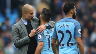 Pep Guardiola embraces Sergio Aguero