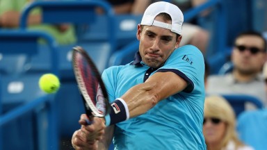 John Isner was beaten by Cincinnati champion Grigor Dimitrov