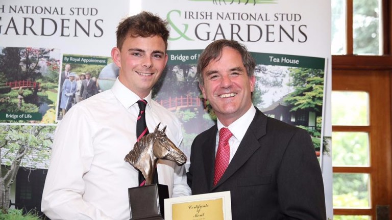 Charlie Dee (left) being presented with a Certificate of Merit by former Irish National Stud chief executive John Osborne