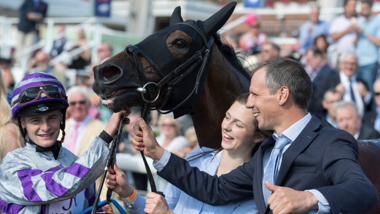 Job done: Trainer Iain Jardine and Callum Rodriguez with Nakeeta in the winner's enclosure