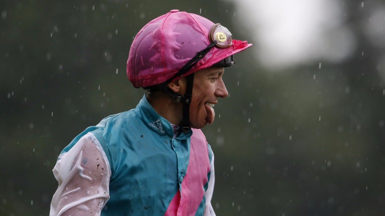 Sing when you're winning: a cheeky Dettori celebration after winning the King George - but will it be the same in the Arc?