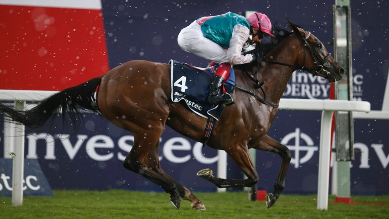 A glistening Enable crosses the line in front in the Oaks, minutes after the heavens opened at Epsom