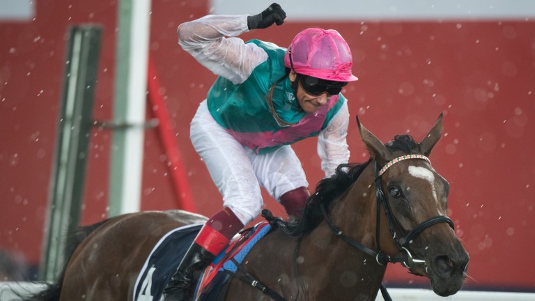 A delighted Frankie Dettori punches the air as Enable lands her first Classic - the Investec Oaks