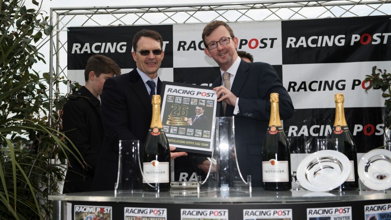Winning memento: Racing Post chief executive Alan Byrne congratulates Aidan O’Brien