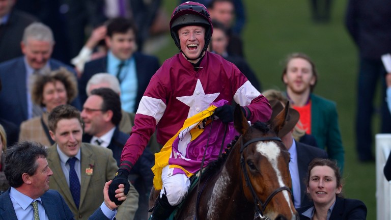 Mikey Fogarty celebrates after winning on Don Poli in the Martin Pipe Conditional Jockeys Handicap Hurdle at the Cheltenham Festival