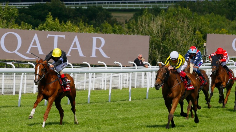 Stradivarius (Andrea Atzeni, left) beats Big Orange (Frankie Dettori) in the Qatar Goodwood Cup