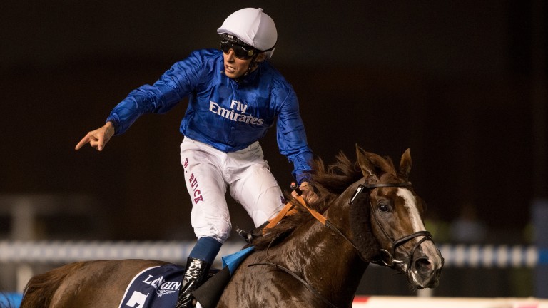 William Buick celebrates Hawkbill's victory in the Sheema Classic