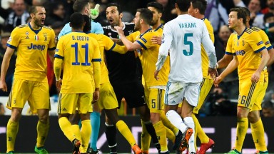 Gianluigi Buffon of Juventus argues with referee Michael Oliver