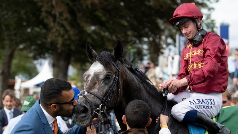 Sealed with a kiss: owner Sheikh Fahad is on hand to greet Roaring Lion