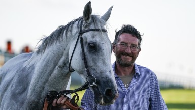 BRIGHTON, ENGLAND - JULY 10: Trainer John Berry with Roy Rocket Brighton Racecourse on July 10, 2018 in Brighton, United Kingdom. (Photo by Alan Crowhurst/Getty Images)