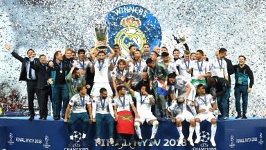 Real Madrid lift the Champions League trophy following victory over Liverpool