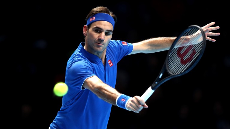Roger Federer was more like his old self in a comfortable victory over Dominic Thiem