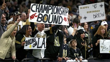 New Orleans Saints fans celebrate their win over the Philadelphia Eagles