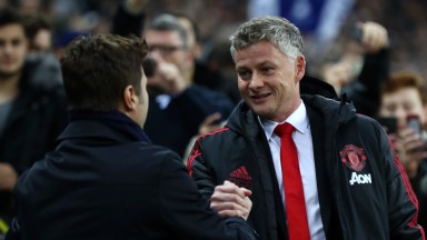 Manchester United manager Ole Gunnar Solskjaer greets Spurs boss Mauricio Pochettino