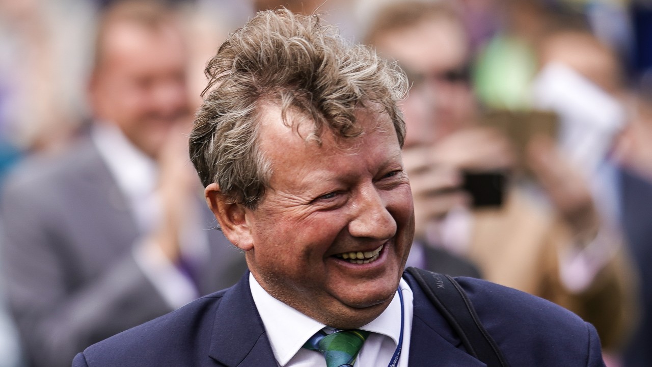 Britain's winningmost trainer Mark Johnston celebrates a big milestone