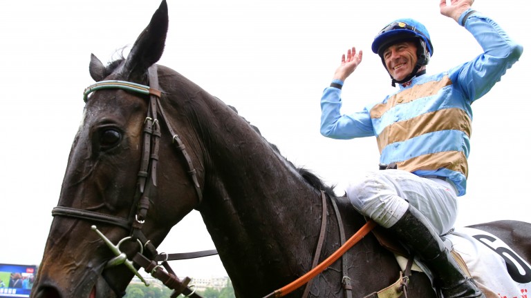 Davy Russell celebrates after steering Carriacou to victory on his very first attempt at Auteuil