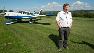 Middleham trainer and registered pilot Mark Johnston with his Cessna aeroplane