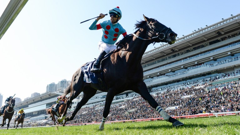 Joao Moreira celebrates victory in the Hong Kong Vase aboard Glory Vase