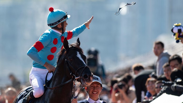 Joao Moreira celebrates winning the Hong Kong Vase