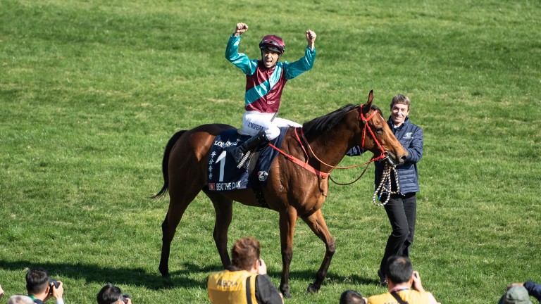 Joao Moreira celebrates Beat The Clock's victory in the Hong Kong Sprint