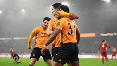 Raul Jimenez of Wolves celebrates with Adama Traore