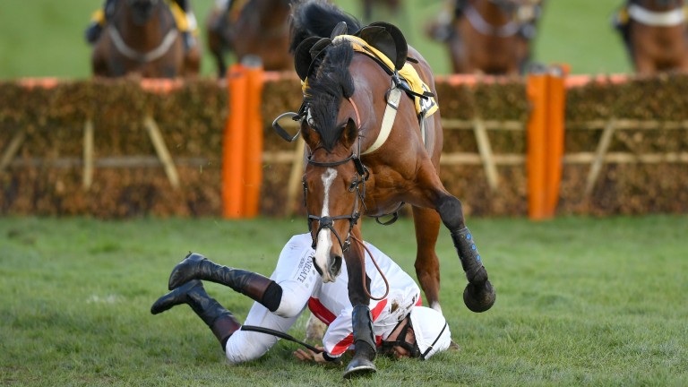 The horse gallops away with Moore beaten on the turf