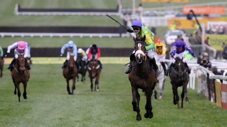 Ruby Walsh celebrates aboard Kauto Star as the duo return to the Cheltenham Gold Cup in 2009