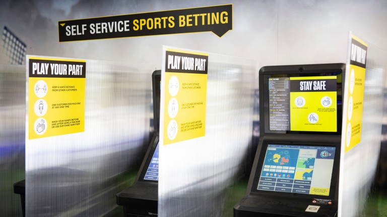 Dividers have been placed between betting shop terminals