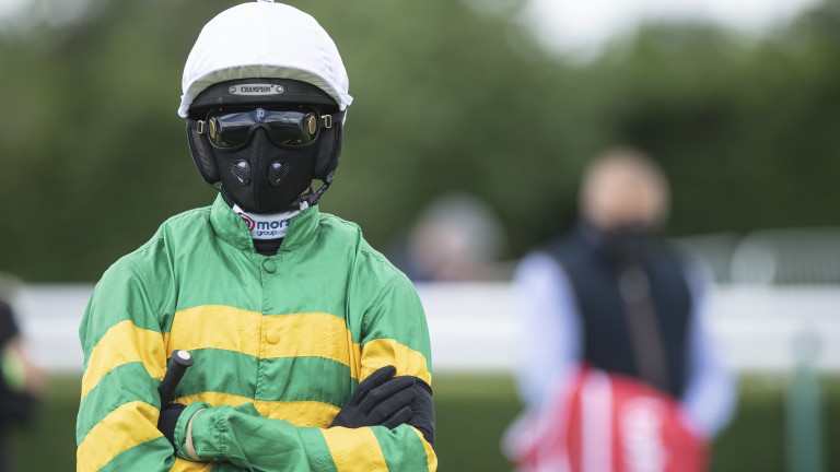 Harry Cobden wears a facemask at Southwell earlier this year