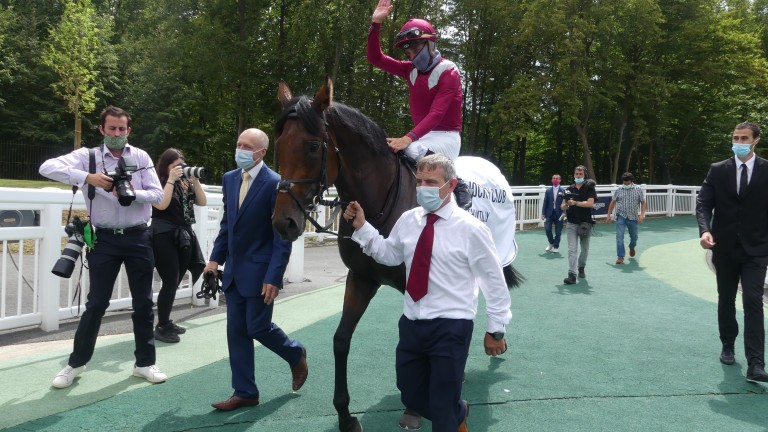 Ioritz Mendizabal celebrates after riding Mishriff to big-race victory at Chantilly