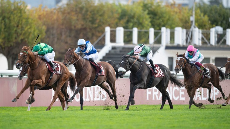 Enable (pink cap) labours up the straight as Sottsass heads for home in the Arc on Sunday