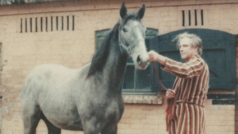 Breeder Jimmy Burridge pictured with a young Desert Orchid