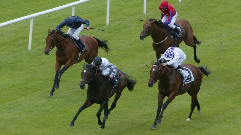 Cockney Rebel leads home  Creachadoir, Duke Of Marmalade and Vital Equine in the Irish 2,000 Guineas at the Curragh