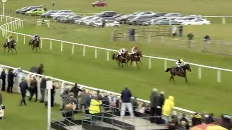 A helpless Jonjo O'Neill Jnr is unseated with Leroy Brown (right) picking up the pieces