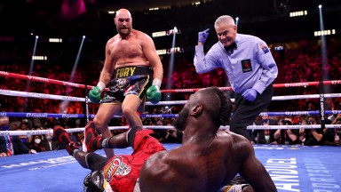 Tyson Fury floors Deontay Wilder in their trilogy fight
