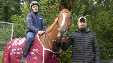 Sean Byrne and Qatar Prix de l'Arc winner Torquator Tasso with trainer Marcel Weiss