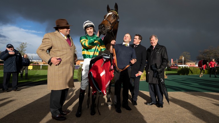 Jonbon with winning connections including Nicky Henderson (left), Sir Anthony McCoy (second right) and owner JP McManus (right)