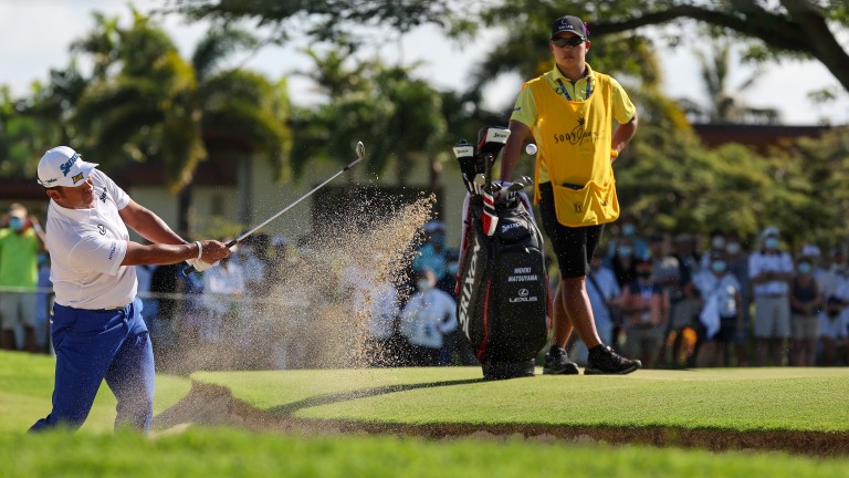 Hideki Matsuyama plays from the bunker in round one of the Sony Open