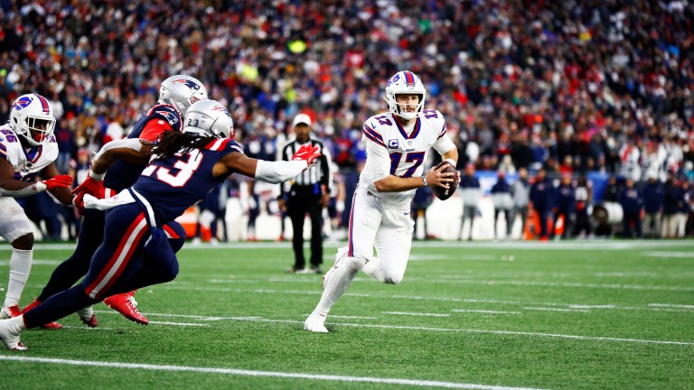 Bills quarterback Josh Allen has to tuck and run in the regular season against the Patriots